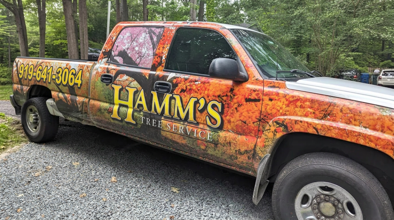 Hamm's Tree Service branded work truck with phone number (919) 641-3064